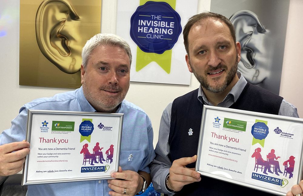 Alan Hopkirk and Michael Pavloski proudly display their Dementia Friends certificates